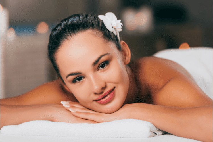 A lady taking a skin care treatment at a medical spa.